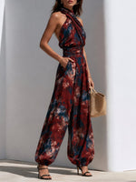 Load image into Gallery viewer, Women's Red Floral Jumpsuit Halter Neck Wide Leg Flowing Wrap Style