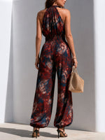 Load image into Gallery viewer, Women's Red Floral Jumpsuit Halter Neck Wide Leg Flowing Wrap Style