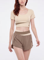 Load image into Gallery viewer, Amara Panelled Crop Yoga T-Shirt - In Khaki