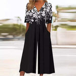 Load image into Gallery viewer, Effortless Floral Wide Leg Jumpsuit for Women with V Neck Elbow Sleeve Flowing Palazzo Style