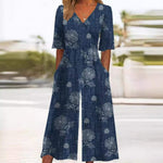 Load image into Gallery viewer, Effortless Floral Wide Leg Jumpsuit for Women with V Neck Elbow Sleeve Flowing Palazzo Style