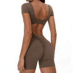 Load image into Gallery viewer, Backless Contour Jumpsuit Breathable Performance Nylon
