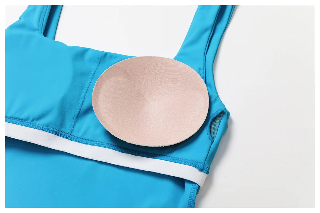 Luxurious Contoured Yoga Jumpsuit With Pleated Skirt Set