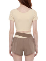 Load image into Gallery viewer, Amara Panelled Crop Yoga T-Shirt - In Khaki
